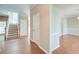 Open foyer with hardwood floors, staircase, and natural light at 195 Highwoods Plantation Ave, Summerville, SC 29485