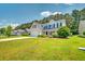 Charming two-story home featuring a well-manicured lawn and inviting curb appeal at 195 Highwoods Plantation Ave, Summerville, SC 29485
