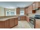 Well-equipped kitchen includes a breakfast bar and seamless access to an adjacent breakfast nook at 195 Highwoods Plantation Ave, Summerville, SC 29485
