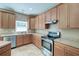 The kitchen features stainless steel appliances and ample counter space, making meal preparation easy at 195 Highwoods Plantation Ave, Summerville, SC 29485