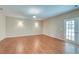 Spacious living room featuring hardwood floors, recessed lighting, and double glass doors at 195 Highwoods Plantation Ave, Summerville, SC 29485