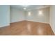 Bright living room features hardwood floors and neutral paint tones, creating a warm atmosphere at 195 Highwoods Plantation Ave, Summerville, SC 29485