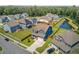 Areal view of homes in a neighborhood with ponds and treed buffers at 203 Plowden Mill Ct, Summerville, SC 29485
