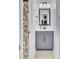 Bathroom featuring a grey vanity, framed mirror, and floral shower curtain at 203 Plowden Mill Ct, Summerville, SC 29485