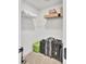 Walk-in closet with wire shelving on the top, suitable for storage of large suitcases at 203 Plowden Mill Ct, Summerville, SC 29485