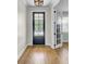 Elegant foyer with hardwood floors and ample natural light at 203 Plowden Mill Ct, Summerville, SC 29485