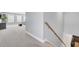 Upstairs hall with staircase at 203 Plowden Mill Ct, Summerville, SC 29485
