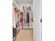 Efficiently organized walk-in closet with shelving, racks, and ample storage space for clothes and accessories at 203 Plowden Mill Ct, Summerville, SC 29485