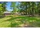 Brick home with a large backyard and storage shed at 204 Runnymede Ln, Summerville, SC 29485