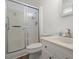 Bathroom includes a shower with sliding glass door, toilet, and vanity at 204 Runnymede Ln, Summerville, SC 29485