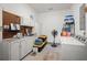 Laundry and garage space with cabinets, fan, and washer at 204 Runnymede Ln, Summerville, SC 29485
