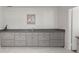 Kitchen features gray cabinetry and countertops offering ample storage and food preparation space at 204 Runnymede Ln, Summerville, SC 29485