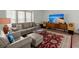 Comfortable living room with stylish furniture, a TV, and a decorative rug at 204 Runnymede Ln, Summerville, SC 29485