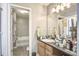Bathroom featuring a vanity and sink, mirror, and a bathtub with shower at 210 Allen Richard Ct # A&B, Moncks Corner, SC 29461