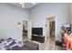 Bedroom featuring two doorways and a television sitting atop a dark dresser at 210 Allen Richard Ct # A&B, Moncks Corner, SC 29461