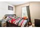 Bedroom featuring a window with black out curtains and bed with basketball decor at 210 Allen Richard Ct # A&B, Moncks Corner, SC 29461