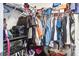 Walk in closet with dark dresser and filled with hung and folded clothes at 210 Allen Richard Ct # A&B, Moncks Corner, SC 29461