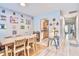Dining room featuring a long wooden table, hardwood floors, and artwork on the walls at 210 Allen Richard Ct # A&B, Moncks Corner, SC 29461