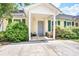 Inviting entrance with a covered porch, gray door, and well-maintained landscaping adds curb appeal at 210 Allen Richard Ct # A&B, Moncks Corner, SC 29461