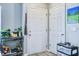Entryway featuring two white doors, gray walls, and a rolling cart for storage at 210 Allen Richard Ct # A&B, Moncks Corner, SC 29461