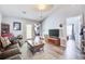 Inviting living room with wood-look floors and multiple entryways to other rooms at 210 Allen Richard Ct # A&B, Moncks Corner, SC 29461