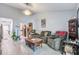 Spacious living room featuring wood-look floors and comfortable seating arrangements at 210 Allen Richard Ct # A&B, Moncks Corner, SC 29461