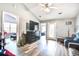Spacious living room with wood-look floors, vaulted ceilings, and ample natural light at 210 Allen Richard Ct # A&B, Moncks Corner, SC 29461