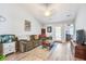 Cozy living room with plush seating, wood-look flooring, and a ceiling fan at 210 Allen Richard Ct # A&B, Moncks Corner, SC 29461