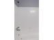 White tiled bath and shower combo with brushed nickel shower head and faucet at 210 Froman Dr, Summerville, SC 29483