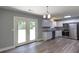 Updated kitchen with granite countertops, stainless steel appliances and direct access to a patio at 210 Froman Dr, Summerville, SC 29483