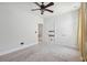 Spacious bedroom featuring ample closet space, neutral carpeting, and a serene atmosphere at 2242 Dewees Creek Dr, Mount Pleasant, SC 29466