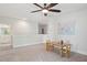 Spacious bonus room featuring carpeted floors, ceiling fan, and wall art at 2242 Dewees Creek Dr, Mount Pleasant, SC 29466