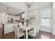 Beautiful dining area with a view of the modern kitchen at 2242 Dewees Creek Dr, Mount Pleasant, SC 29466
