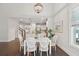 Bright dining area with a view of the modern kitchen at 2242 Dewees Creek Dr, Mount Pleasant, SC 29466
