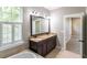 Bathroom with a double vanity, granite countertop, and soaking tub at 225 Slipper Shell Ct, Mount Pleasant, SC 29464
