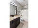 Bathroom features a granite countertop vanity and shower-tub combination at 225 Slipper Shell Ct, Mount Pleasant, SC 29464