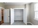 Spacious closet with custom shelving, carpet floors, and ample storage showcases functionality and design at 225 Slipper Shell Ct, Mount Pleasant, SC 29464