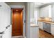 Home elevator provides accessibility and convenience, blending seamlessly with the kitchen's design at 225 Slipper Shell Ct, Mount Pleasant, SC 29464