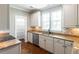 Well-appointed kitchen featuring stainless steel appliances, granite countertops, and a pantry for storage at 225 Slipper Shell Ct, Mount Pleasant, SC 29464