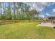 Large, well-maintained backyard with patio dining, ideal for outdoor activities at 227 Spectrum Rd, Summerville, SC 29486