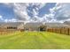 Fenced backyard with lush lawn, a patio, and room for recreation at 227 Spectrum Rd, Summerville, SC 29486