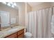 Bathroom featuring a vanity with granite countertop and a shower with a decorative shower curtain at 227 Spectrum Rd, Summerville, SC 29486