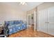 Bedroom with a daybed, ceiling fan, and French doors leading to another room at 227 Spectrum Rd, Summerville, SC 29486