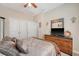 Bedroom with a large dresser, TV, and multiple closets for ample storage at 227 Spectrum Rd, Summerville, SC 29486