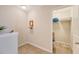 Upstairs hallway with storage closet, shelving and decorative mirror at 227 Spectrum Rd, Summerville, SC 29486