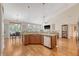 Open-concept kitchen island with granite countertops and stainless steel dishwasher at 227 Spectrum Rd, Summerville, SC 29486