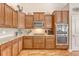 Bright kitchen featuring stainless steel appliances, granite countertops, and wood flooring at 227 Spectrum Rd, Summerville, SC 29486