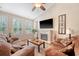 Cozy living room featuring a decorative fireplace and comfortable seating at 227 Spectrum Rd, Summerville, SC 29486