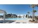 Community pool featuring lounge chairs, palm trees, and ample space to relax and enjoy at 227 Spectrum Rd, Summerville, SC 29486