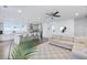 Open-concept living space featuring a modern kitchen, comfortable seating area, and hardwood floors at 2292 Skyler Dr, Mount Pleasant, SC 29466